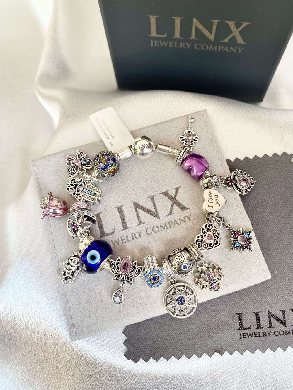 Linx Snake Chain Bracelet with Hamsa Hand and Evil Eye Themed Charms